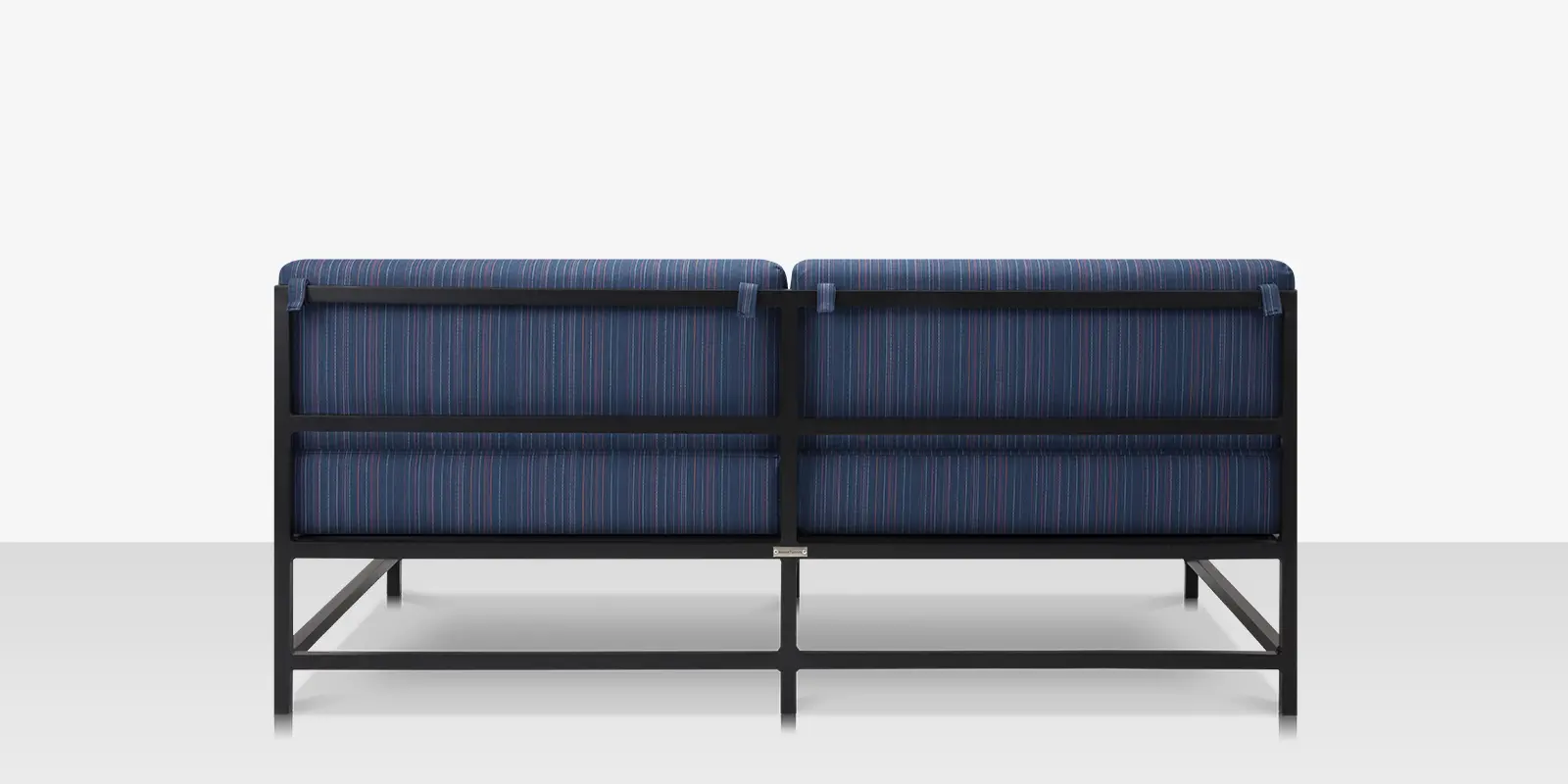 delano-loveseat-armless-back.webp